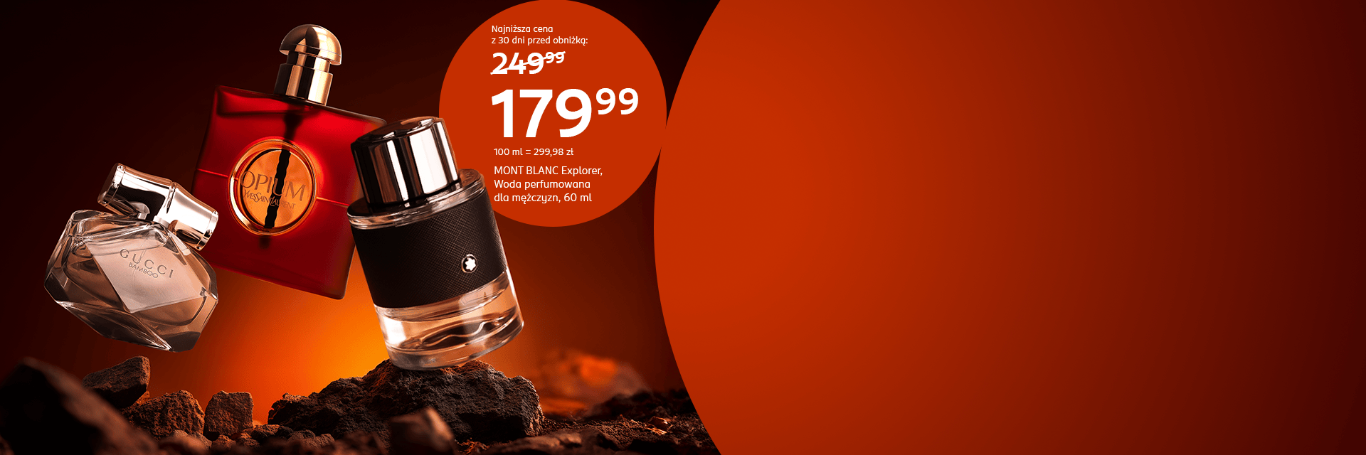 Baner promocyjny drogerii Rossmann online z flakonem Montblanc Explorer 60 ml w cenie 179,99 zł, obok perfumy YSL Black Opium i Gucci na tle czerwono-pomarańczowym.