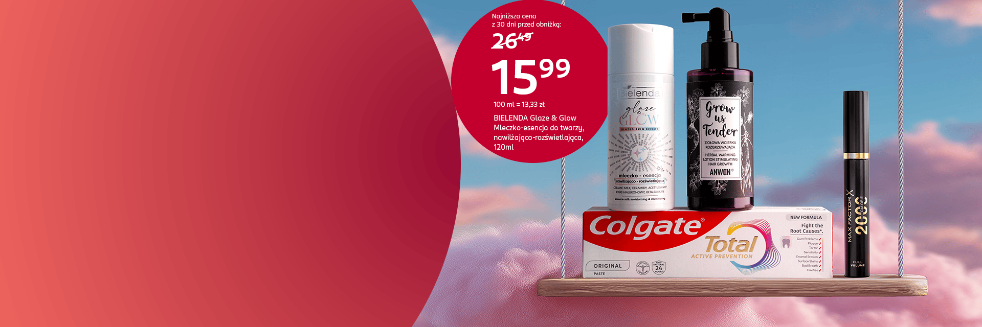 Promocje w drogerii Rossmann. Na bannerze mleczko-esencja Bielenda Glaze & Glow 120 ml w cenie 15,99 zł, obok wcierka Anwen, pasta Colgate Total i tusz do rzęs Max Factor 2000 Calorie.